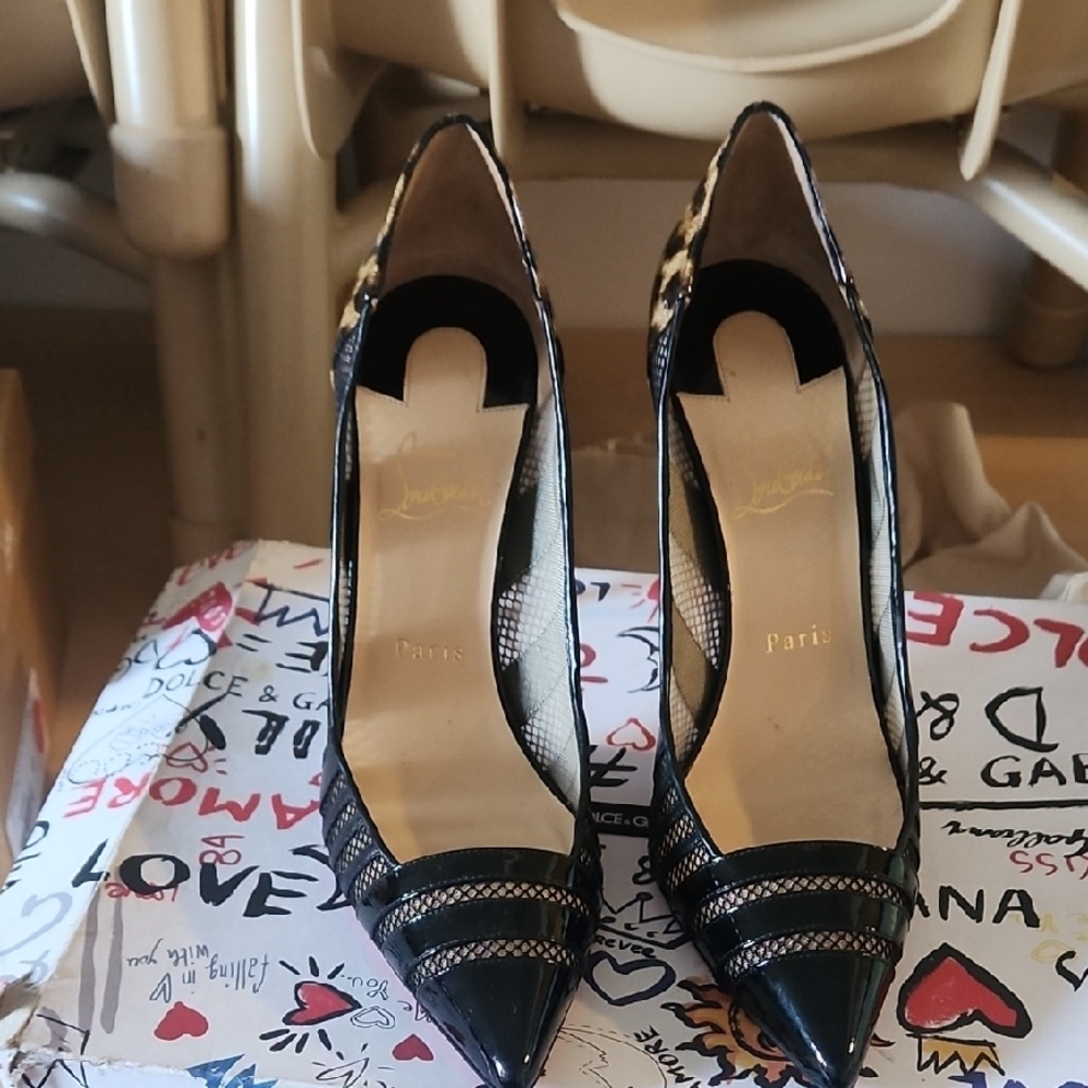 Christian Louboutin Black and Gold Heels